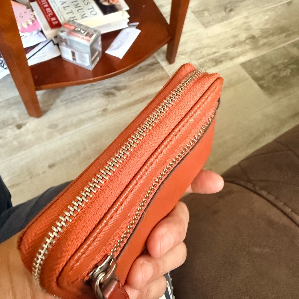 Tumi Orange Saffiano Zip Wallet with Gold Bar Detail - Picture 3 of 4